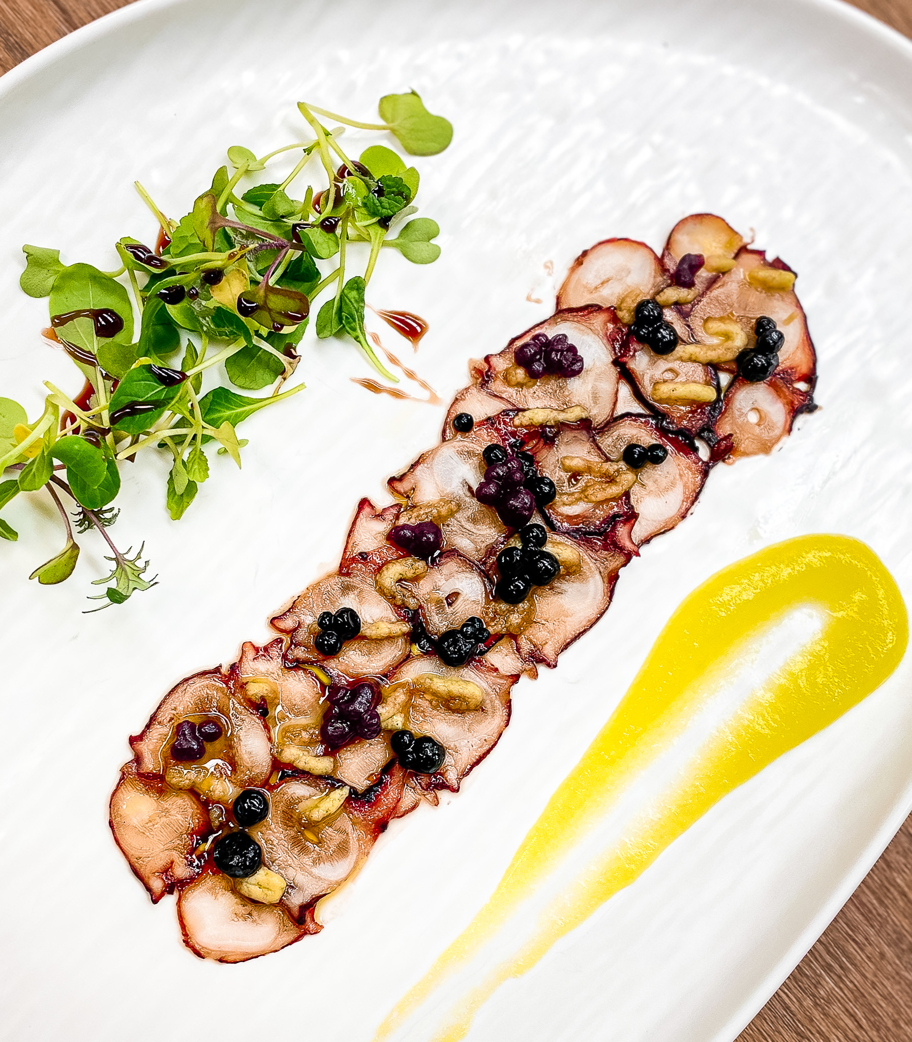 Exquisite, chef-curated culinary presentation featuring artisan ingredients and delicate plating crafted for an exclusive private estate wedding dinner.